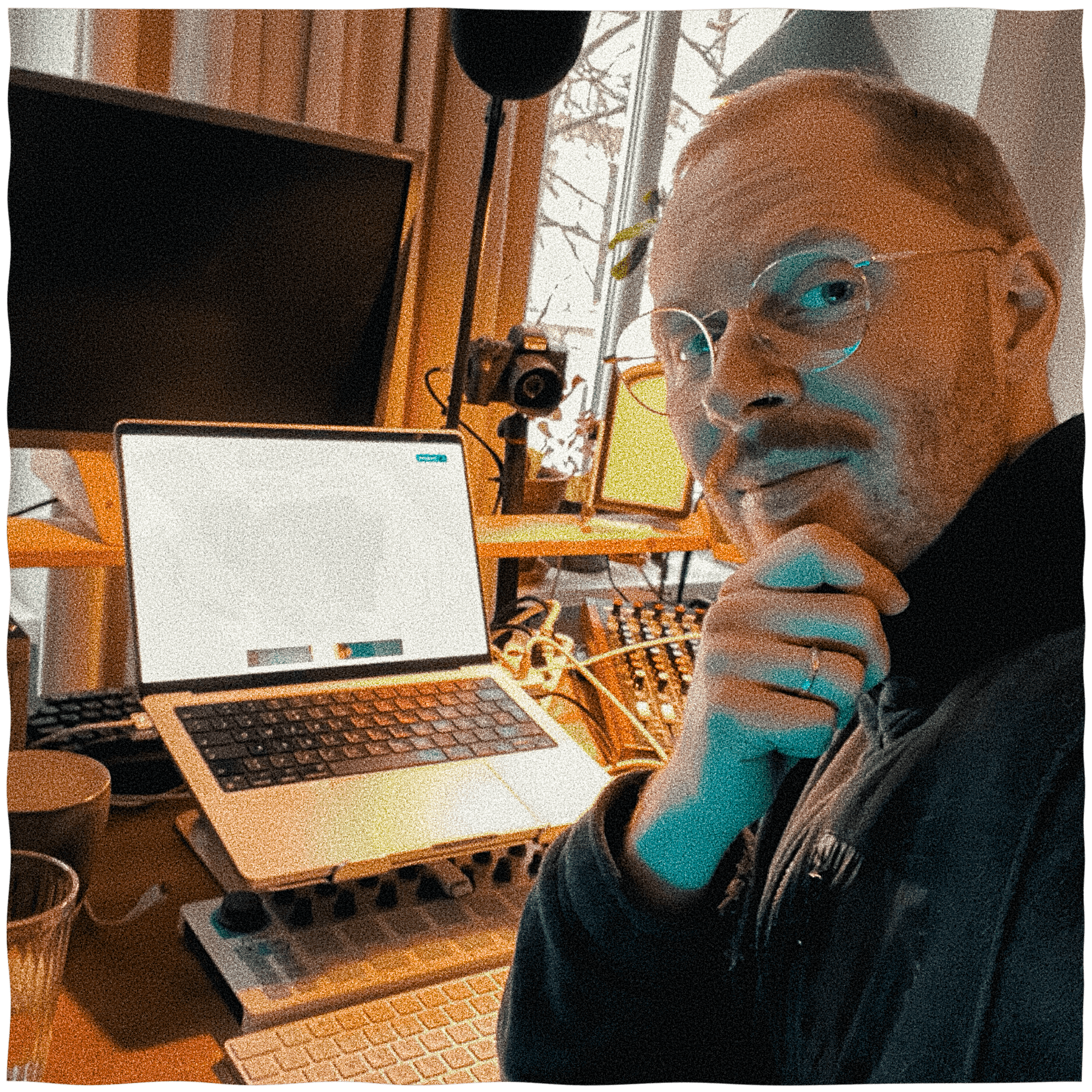 Happy-looking mxmx sitting at desk